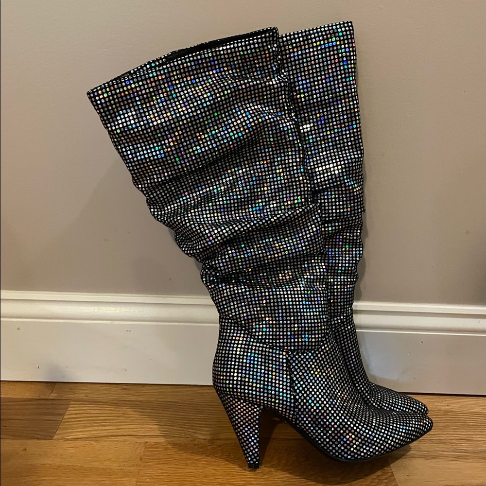 Knee high stiletto heel boots